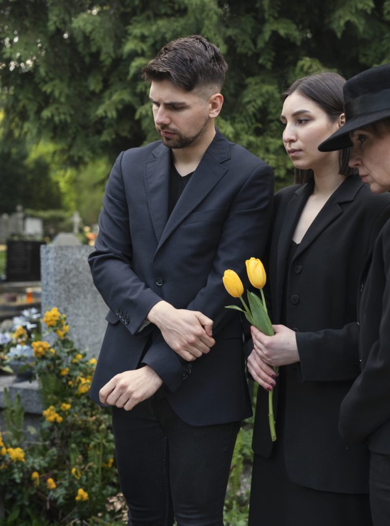 mourning-family-together-cemetery